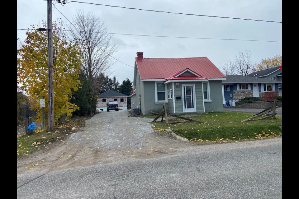 A Brandon Crescent resident is upset that a house being built in the backyard of a Mississaga Street West property, above, will negatively impact his quality of life and his neighbourhood.