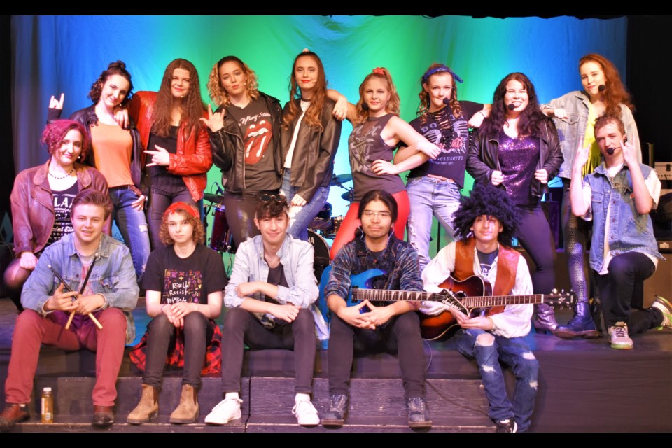 The performers and the band behind Thunder Rock pose for a photo prior to their dress rehearsal Saturday. The high-energy rock concert will be staged Wednesday and Thursday night at Twin Lakes. Dave Dawson/OrilliaMatters