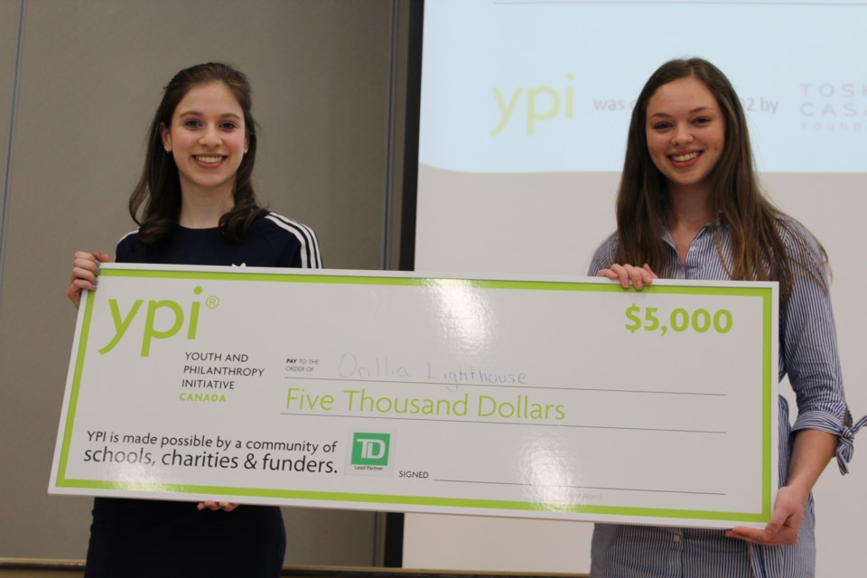 Andie Kaiser, left, and Meghan Sawatsky earned $5,000 for the Lighthouse during Wednesday's Youth in Philanthropy Initiative competition at Orillia Secondary School. Nathan Taylor/OrilliaMatters