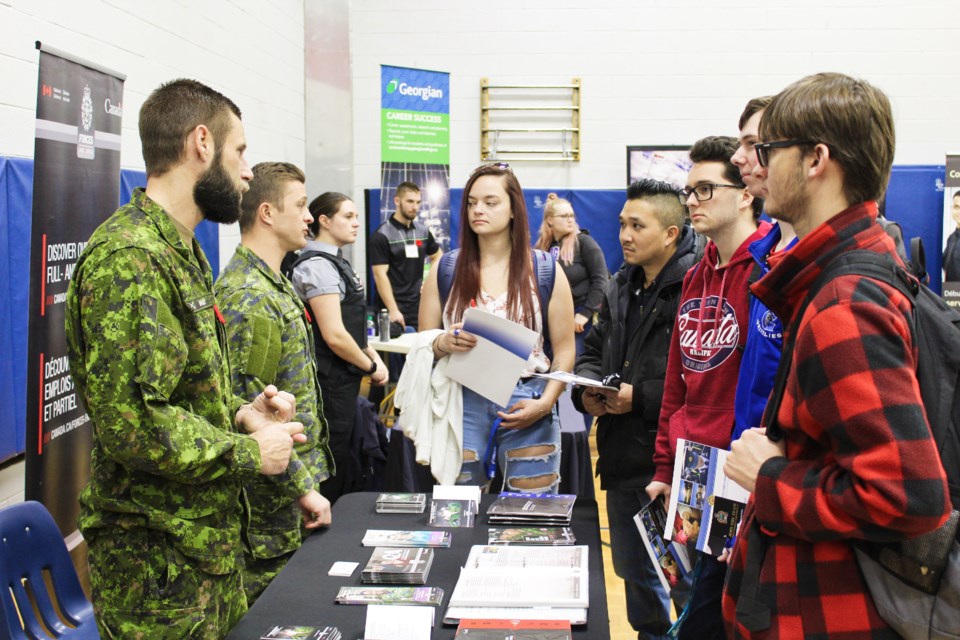 Georgian College students speak with members of the Canadian Forces during a career expo Wednesday at the Orillia campus. Nathan Taylor/OrilliaMatters