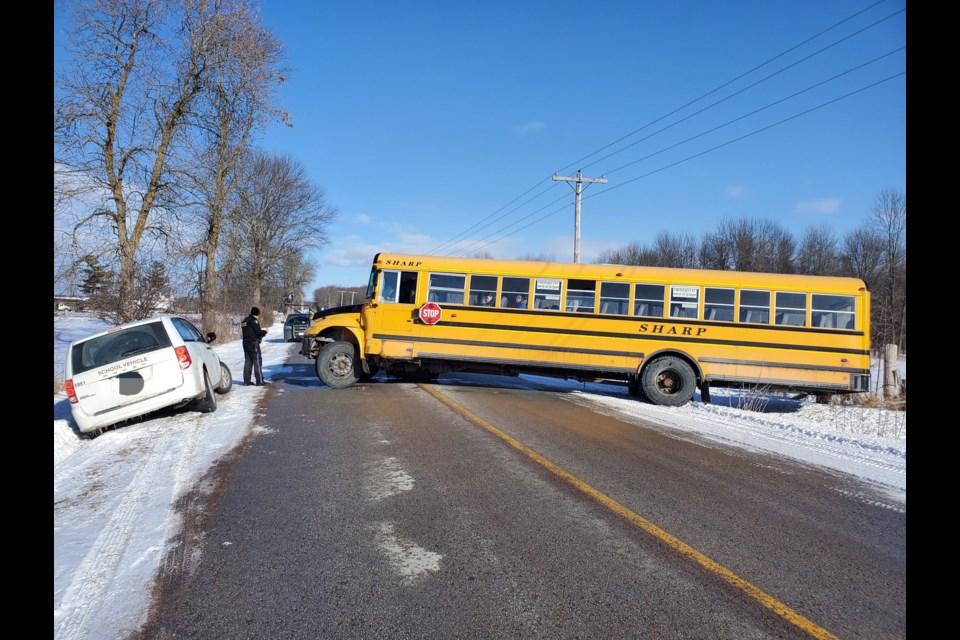A school bus and a van used as a school vehicle went into the ditch Friday on Muley Point Road in Ramara Township.