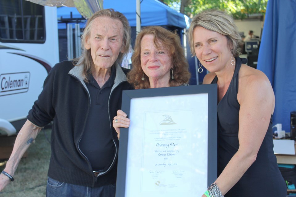Nearly 60 years after debuting Morning Dew at the Mariposa Folk Festival, Bonnie Dobson, centre, was back at the Orillia festival Saturday to see the song inducted in the Canadian Songwriters Hall of Fame. Doing the honour were Gordon Lightfoot and Vanessa Thomas, executive director of the hall of fame. Nathan Taylor/OrilliaMatters