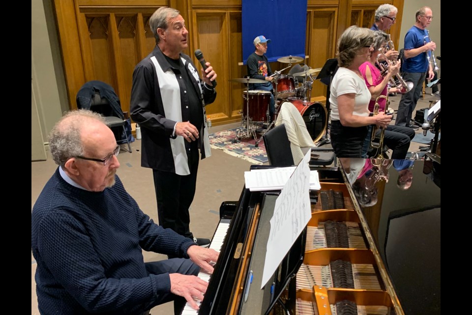John Brown and Rick Stephenson tune up for the Orillia Concert Band's presentation of Frank Sinatra Comes Home to Orillia. The show will be presented May 11 and May 12.