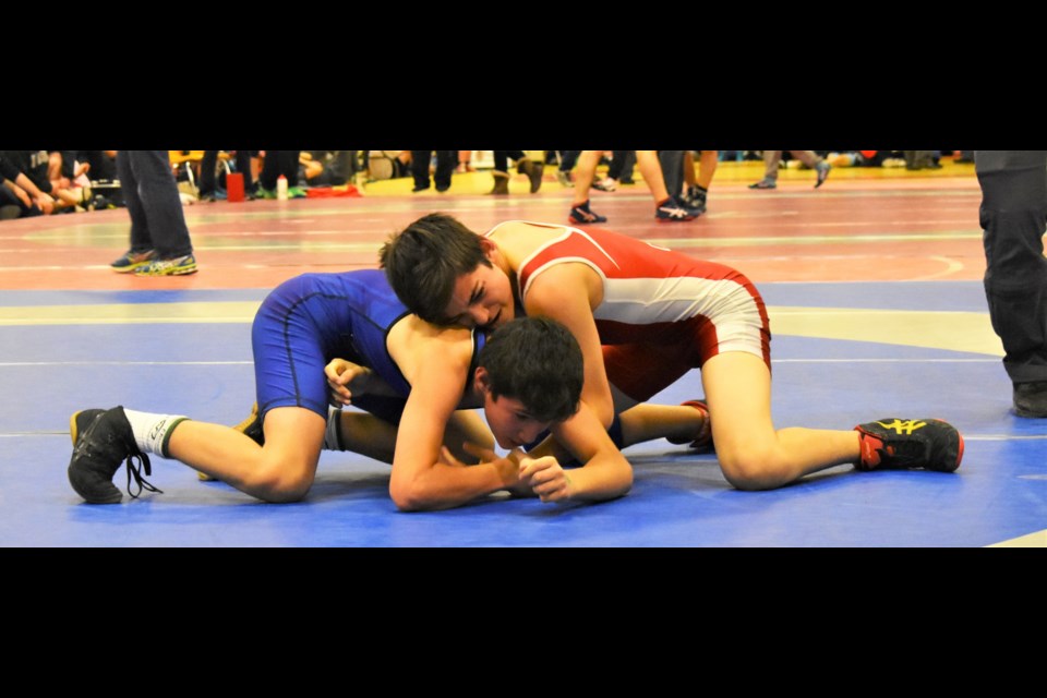 These two lads battled tooth and nail in an intense match Friday at Twin Lakes Secondary School. More than 180 wrestlers are competing at this weekend's Ontario Winter Games. Dave Dawson/OrilliaMatters