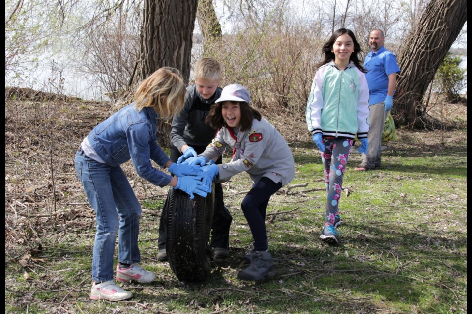 Orillia youth helped clean up Kitchener Park as part of Saturday's Pitch-in event. Mehreen Shahid/OrilliaMatters