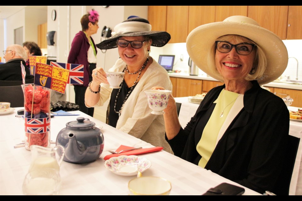 Friends Wendy Morgan and Peg Kennedy sipped traditional Yorkshire tea at the royal wedding shower held Saturday at the Orillia Public Library. Mehreen Shahid/OrilliaMatters