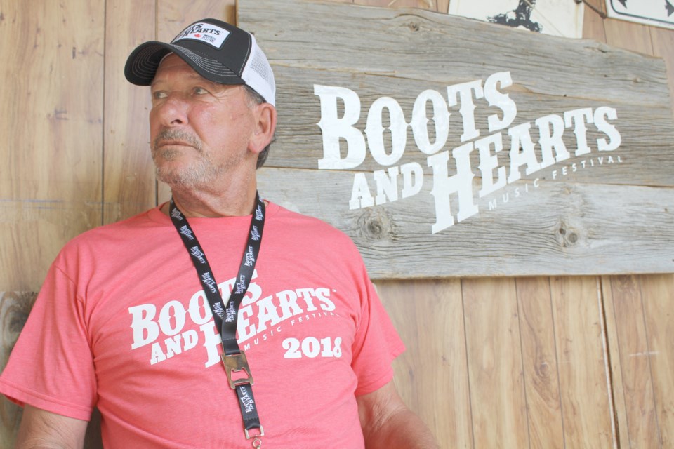 Burl's Creek co-owner Stan Dunford takes a breather Sunday on the last day of Boots and Hearts. Nathan Taylor/OrilliaMatters