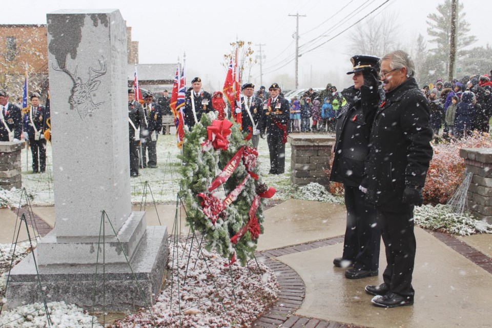 Rama First Nation Chief Rodney Noganosh salutes after laying a wreath at the cenotaph Friday. Nathan Taylor/OrilliaMatters