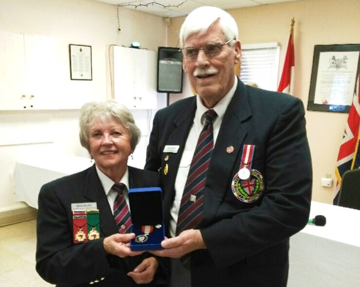 Reta Mulholland Keeler is shown with Jack Gillard, president of Orillia's ANAF, Unit 400. Mulholland Keeler was presented with the Governor General's Sovereign's Medal for Volunteers. Supplied photo