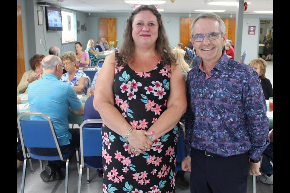 Cathy Graham, program manager with the Orillia and District Literacy Council, is shown with Simcoe North MP Bruce Stanton, who hosted the ninth beef supper fundraiser for the organization Thursday at the Moose Lodge. Nathan Taylor/OrilliaMatters