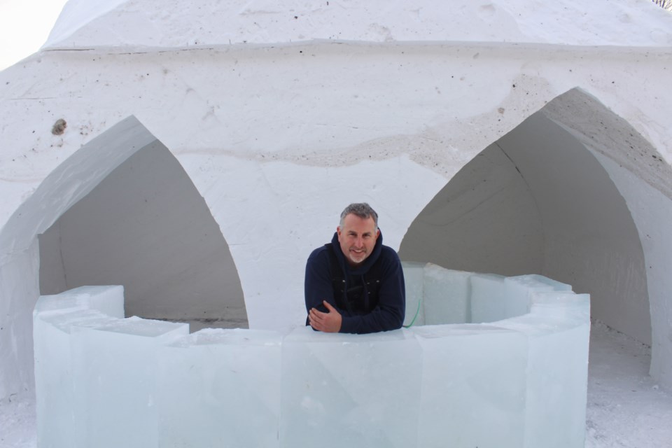 Chad Cooke, president of the Severn Winterfest, is shown with the almost-finished ice bar that will be a feature at this weekend's event. Nathan Taylor/OrilliaMatters
