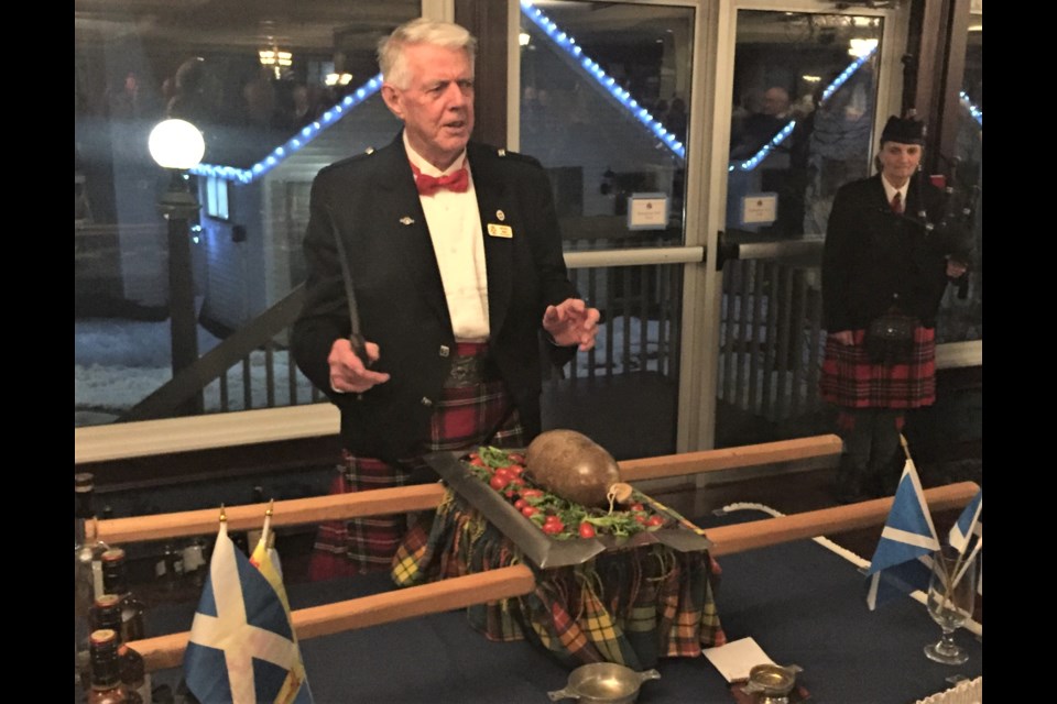 Mike Jones, convener of the Orillia chapter of the Companions of the Quaich, gives the Address to a Haggis during the organization's annual Robbie Burns dinner Sunday at Fern Resort. Supplied photo