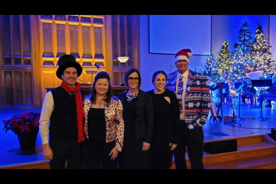 The readers for Friday's presentation of A Christmas Carol at St. Paul's Centre were, from left, Simcoe North MP Adam Chambers, Krista Storey, Marci Csumrik, Kyla Epstein and Mayor Don McIsaac.