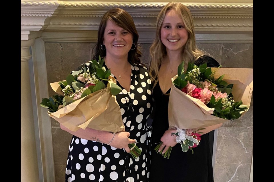 2022 Nelle Carter Woman of the Year Amy Lewis and Lisa Brooking Young Woman of the Year Olivia Emon are shown.