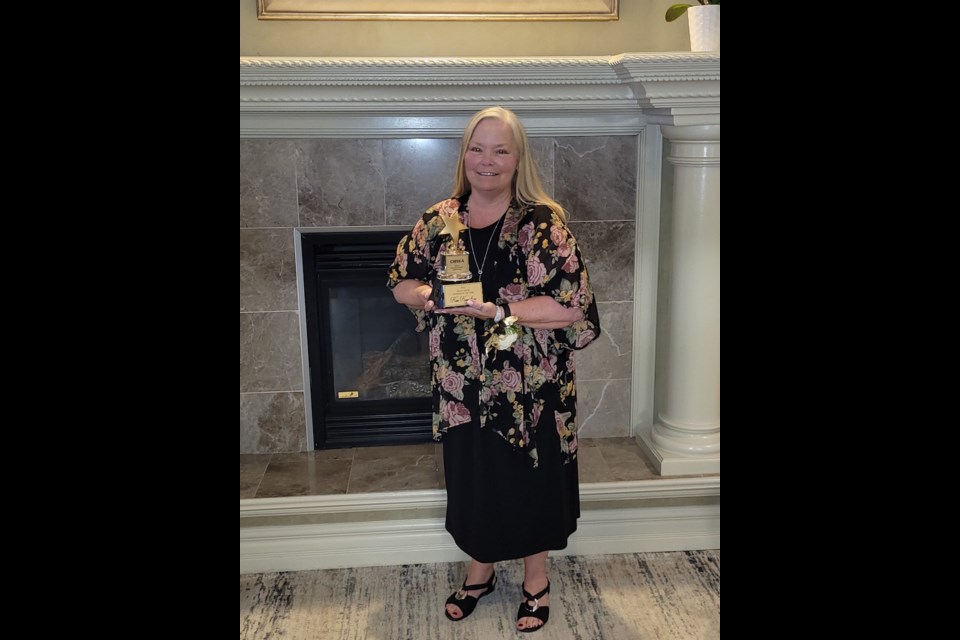 Kim Kneeshaw, the executive director of North Simcoe Victim Services, was named the Orillia Business Women’s Association Woman of the Year on Wednesday night. 