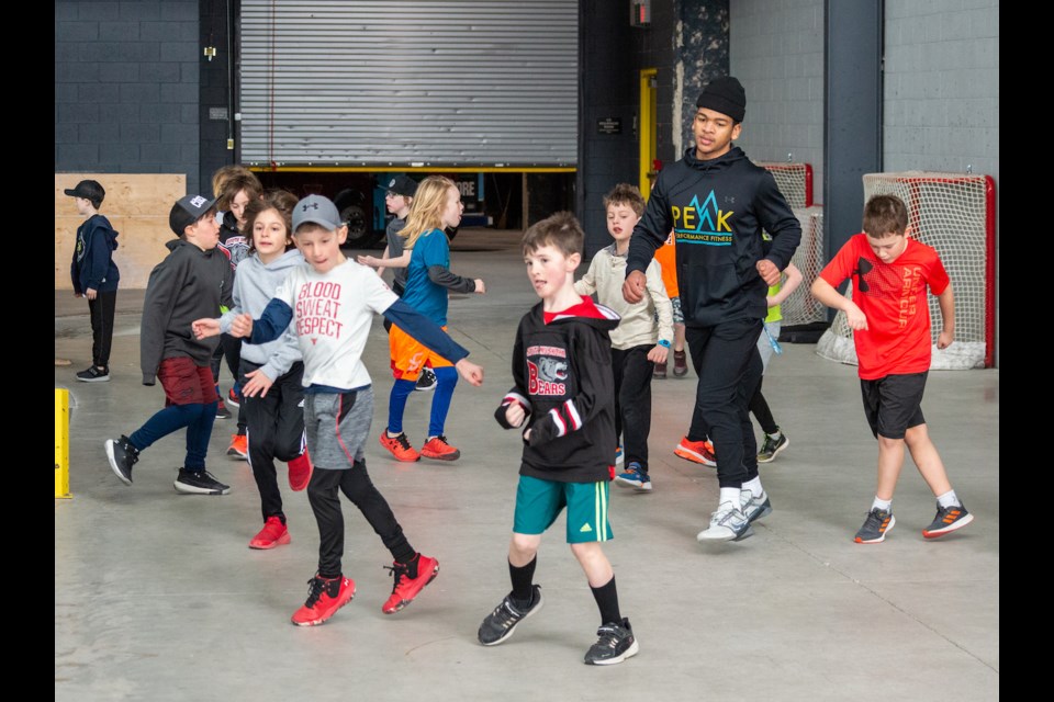 Peak Performance Fitness trainer and athletic coach, Colton Woolhouse, led the Orillia Ice Dogs March break camp in off-ice training on Wednesday morning. 