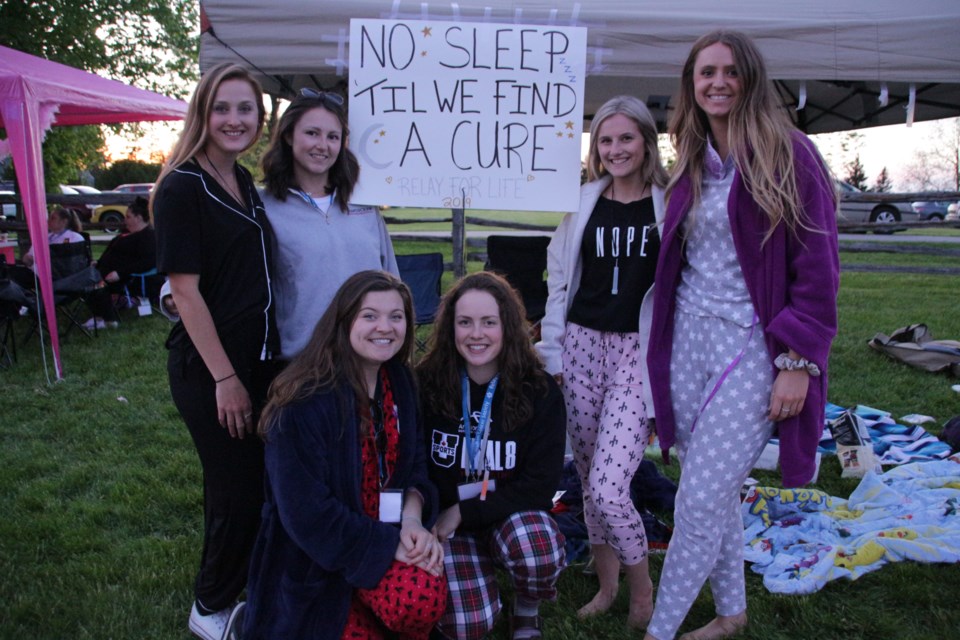 Orillia residents and friends Tori Gunnarson, Samantha Leicht, Christy Scott, Emma Ritcey, and Cassie Broeders came out to Chappell Farms for Friday night's Relay for Life to support their friend, and cancer survivor, Charlotte Van Am. Mehreen Shahid/OrilliaMatters
