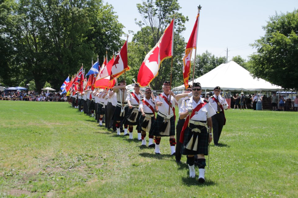 The colour party enters Couchiching Beach Park after the parade made its way down Mississaga Street Saturday to kick off the 42nd annual Orillia Scottish Festival. Mehreen Shahid/OrilliaMatters