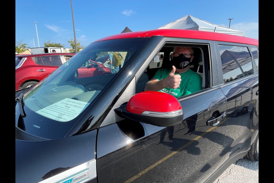 Orillia mayor Steve Clarke is pictured behind the wheel of a 2016 Kia Soul electric vehicle Saturday at the kick-off of Sustainable Orillia Month at Orillia Square mall.