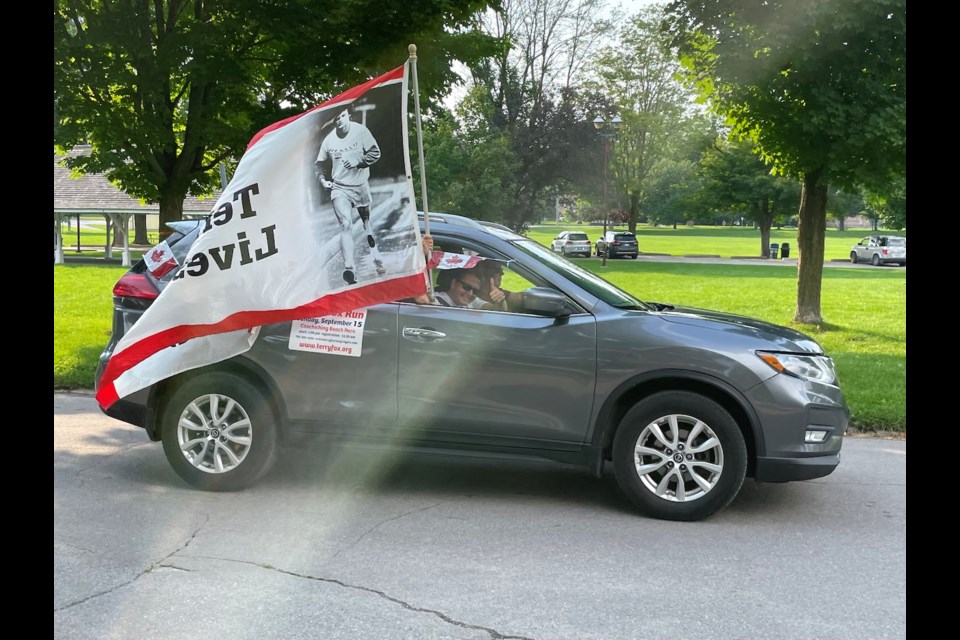 Eight cars paraded through the Terry Fox Circle in Couchiching Beach Park on Tuesday night. The event celebrated the anniversary of the day the Marathon of Hope stopped in Orillia 41 years ago. 