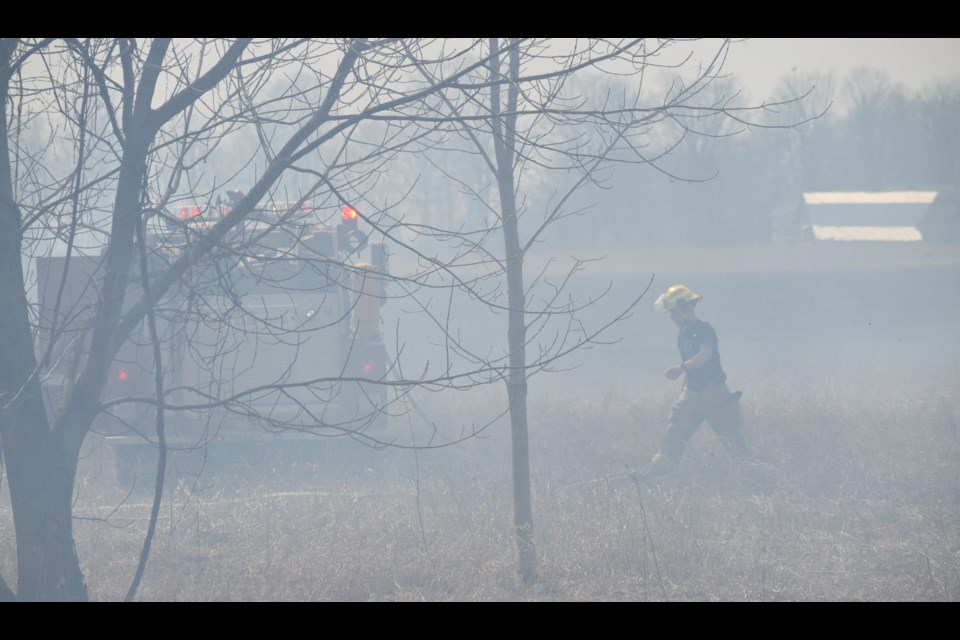 Firefighters were called to a 10-acre grass fire on lands near the corner of Line 10 South and Ridge Road on Monday.
