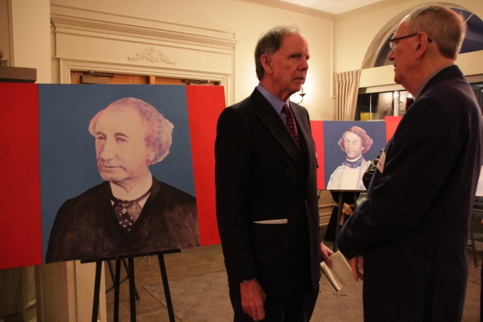 Donald Smith, guest speaker of the night for the 21st annual Sir John A. Macdonald Dinner, talked to Philip Jackman at the dinner Saturday night. Mehreen Shahid/OrilliaMatters