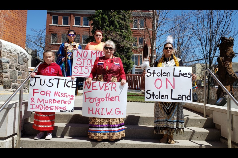 More than a dozen people staged a silent protest in downtown Orillia Sunday to mark the National Day of Missing and Murdered Indigenous Women.