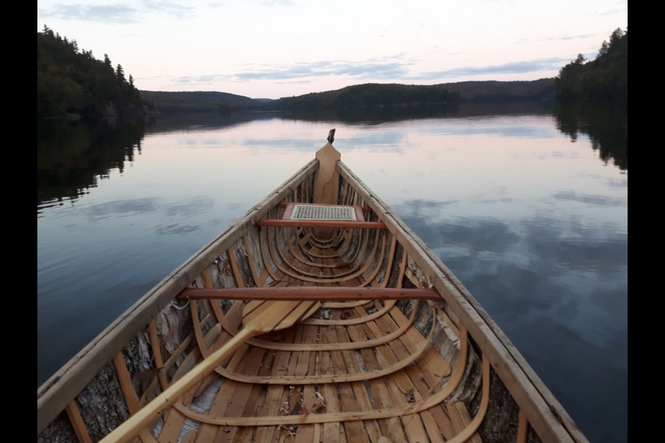 A birch bark canoe built by John Harrison.