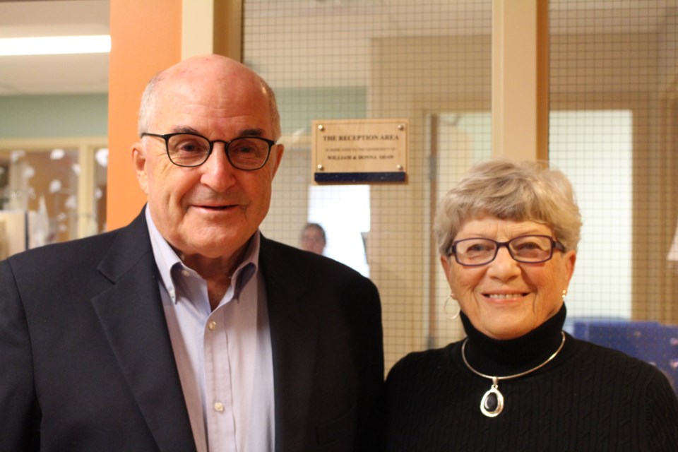 Bill and Donna Shaw, who donated $25,000 to Orillia Soldiers' Memorial Hospital, stand in front of a plaque unveiled recently in the hospital's surgical services department.