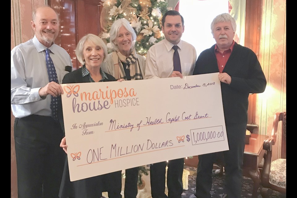 Celebrating the province's $1-million grant to Mariposa House Hospice on Thursday, Dec. 13, 2018, were board members, from left, Si Lowry, Sylvia Smith, Jane Sorensen, Dave Carson and Gord Robertson. Supplied photo