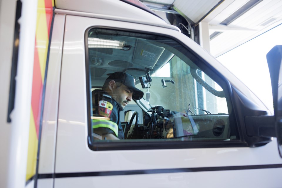 Adam Copegog, primary care paramedic at Rama Paramedic Services, leaves the facility with a colleague. Paramedics must deal with a stressful job amid often life-changing, at times horrific calls of duty.