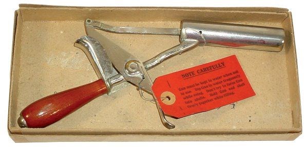 Both household and commercial scoops were made in several sizes under the Fisher name. In 1926 Fredrick Vollans was issued a patent for his invention, The Cold Dog Ice Cream Scoop, from the United States Patent & Trademark Office