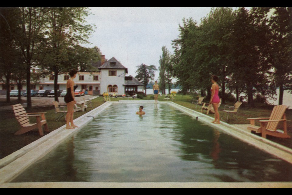 This photo showing the outdoor pool was taken circa 1956 by John R. MacIsaac, the owner of Owaissa Lodge.