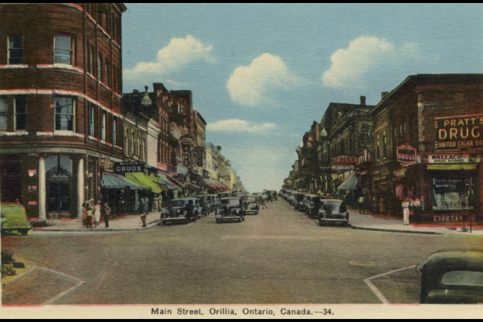 This postcard features the main street looking east, taken in the 1940s.