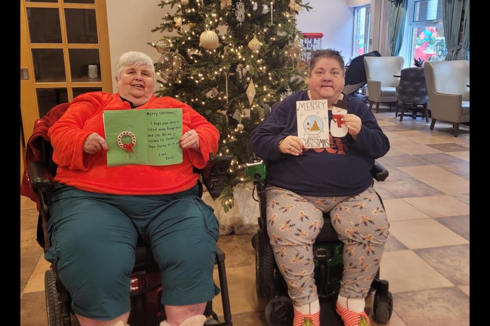 Lynda Bowden, left, and Liz Wigg are resident council leaders at Spencer House in Orillia. They were elated to receive handmade Christmas cards from local students.