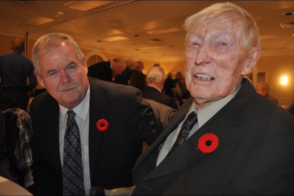 Fred Coulson, right, pictured with good friend Glen Adams, said events like the annual veterans’ dinner play an important role in bringing people with similar experiences together. Andrew Philips/OrilliaMatters