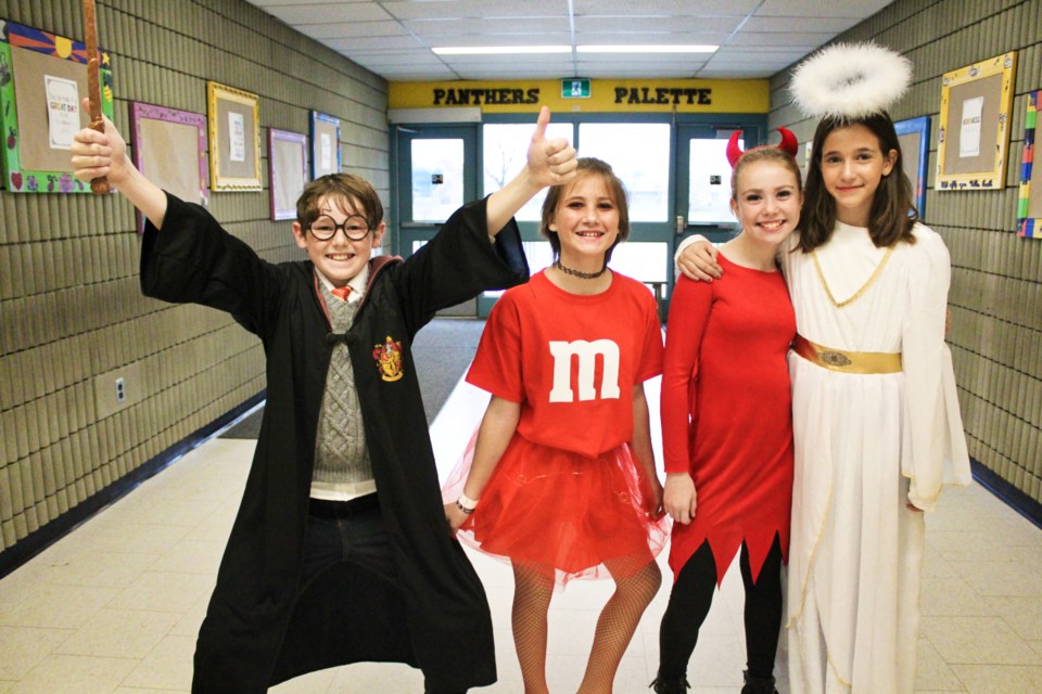Orchard Park Public School students, from left, Ashton, Lyla, Makayla and Hilary show off their Halloween costumes Thursday. Nathan Taylor/OrilliaMatters