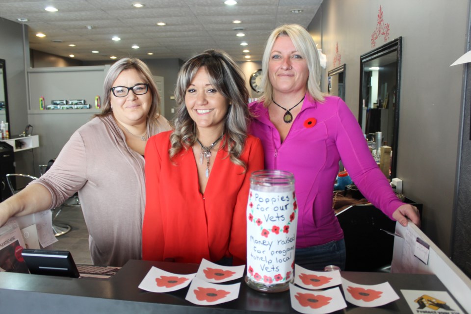 CJ's Hair care is offering half-price haircuts for veterans until Saturday. Pictured, from left, are manager Samantha Charman, owner Janine Ariganello and hairstylist Tina-Marie VanSickle. Nathan Taylor/OrilliaMatters