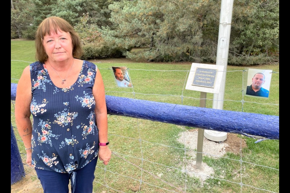 Kathy Green is shown Sunday at the entrance to the Walker Aggregates quarry in Severn Township. A plaque has been installed in memory of Green's son, David Pinkney, who died in a workplace accident at the quarry in 2017. Nathan Taylor/OrilliaMatters