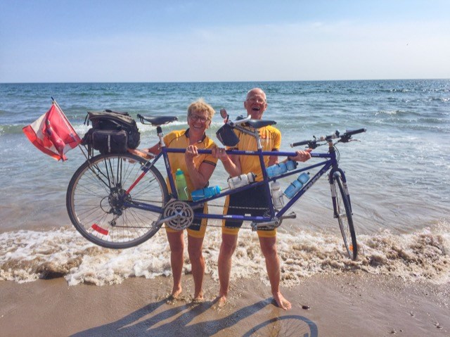 Marja and Peter Slofstra are shown with their tandem bicycle during one of their charity rides. Supplied photo