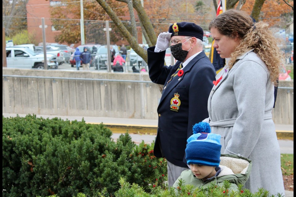 Jennine Collier and her four-year-old son, Connor Nichols, laid the Silver Cross wreath Thursday during the Remembrance Day ceremony in Orillia.