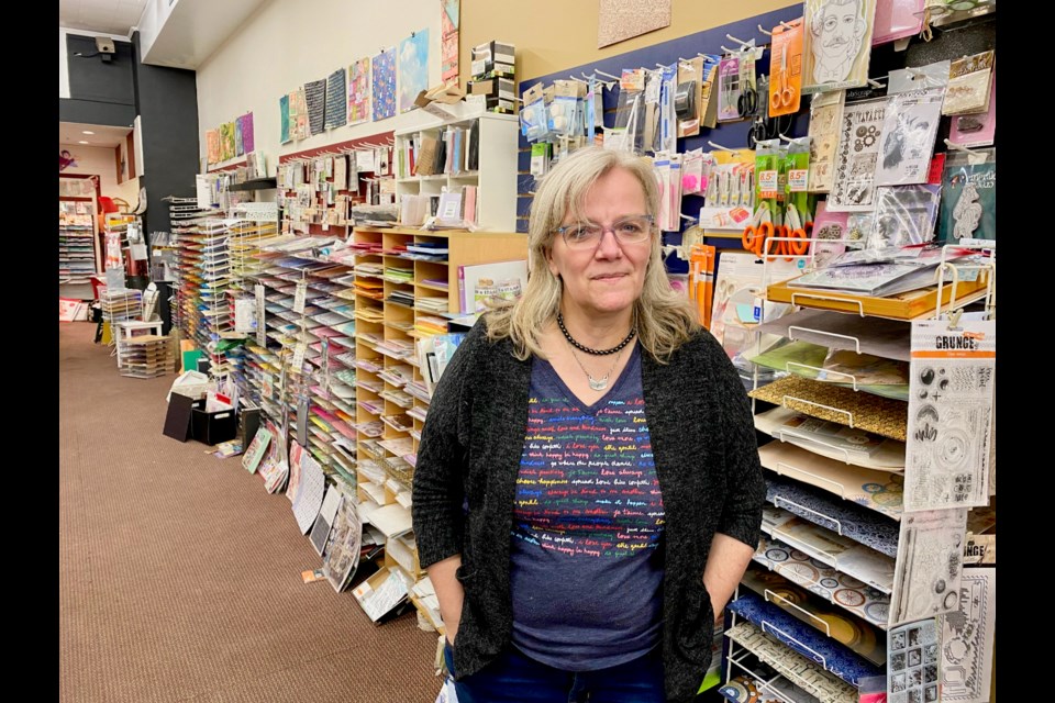 Ellen Wolper, owner of Paper Kapers, is shown in this file photo.