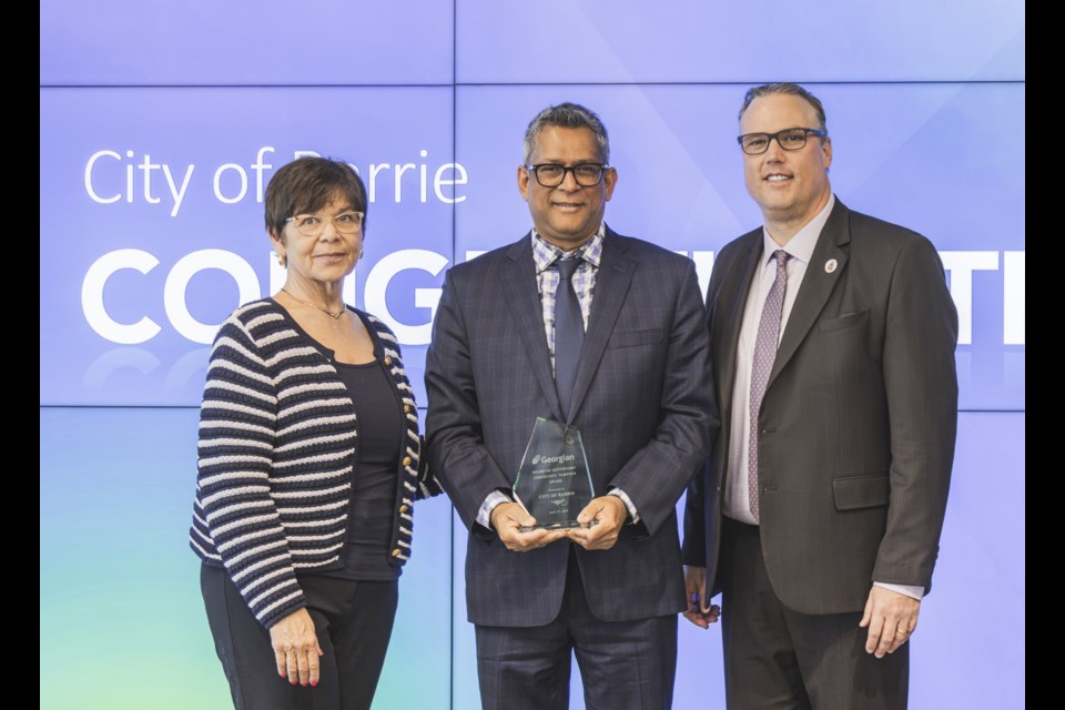 The City of Barrie received a Community Partner Award at the Georgian College Board of Governors Awards of Distinction on April 25. From left: Mary-Anne Willsey, chair of Georgian’s board of governors, Bala Araniyasundaran, general manager of infrastructure and growth development at the City of Barrie, and Kevin Weaver, president and CEO of Georgian College.