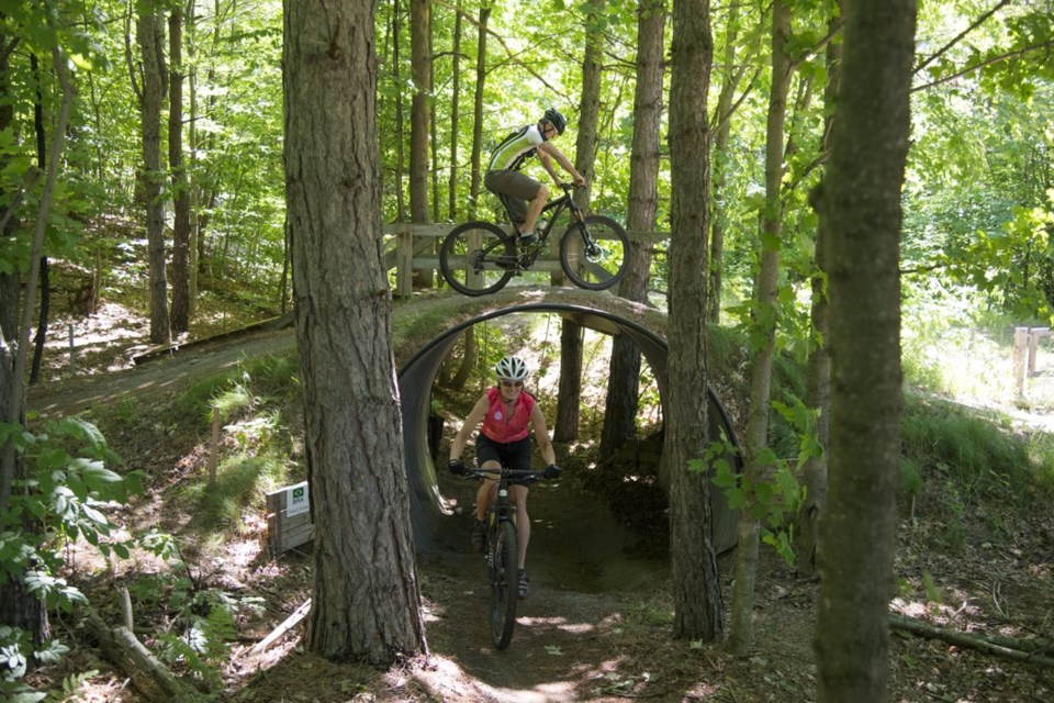 Andrew Watson taking off on a jump at a local trail. 