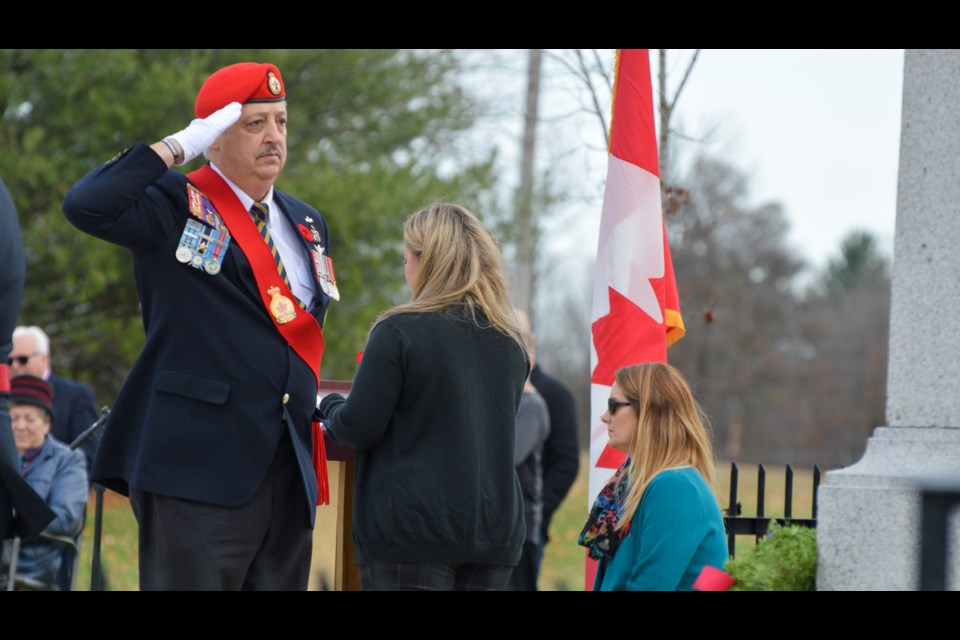 Royal Canadian Legion member Fern Taillefer salutes after laying a wreath at Sunday’s Remembrance Day Ceremony in Oro-Medonte Township.