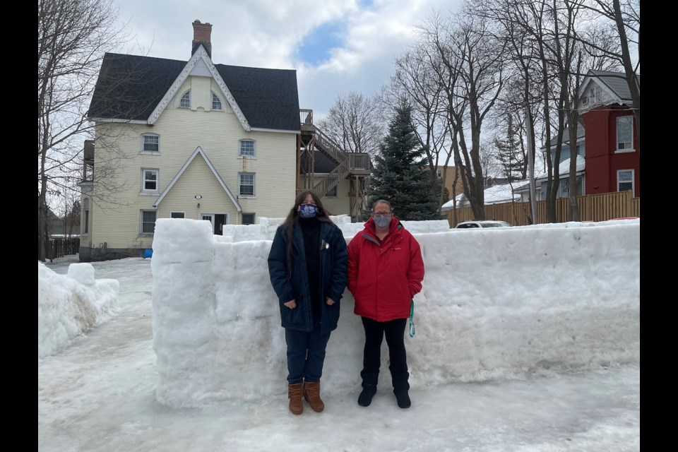 Deb Knell and her friend Jamie Clayton have constructed a snow fort for neighbourhood kids on Neywash Street. 