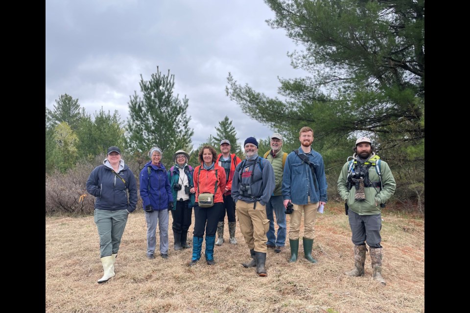 Tanya Clark, far left, fundraising and engagement manager with the Couchiching Conservancy, enjoys a tour of the Morton property with, from left, Jane Bonsteel, Anne Barbour, Dorthea Hangaard, Quinlan MacDonald, Mark Bisset, Gord Ball, Carsten Wisch and Toby Rowland.