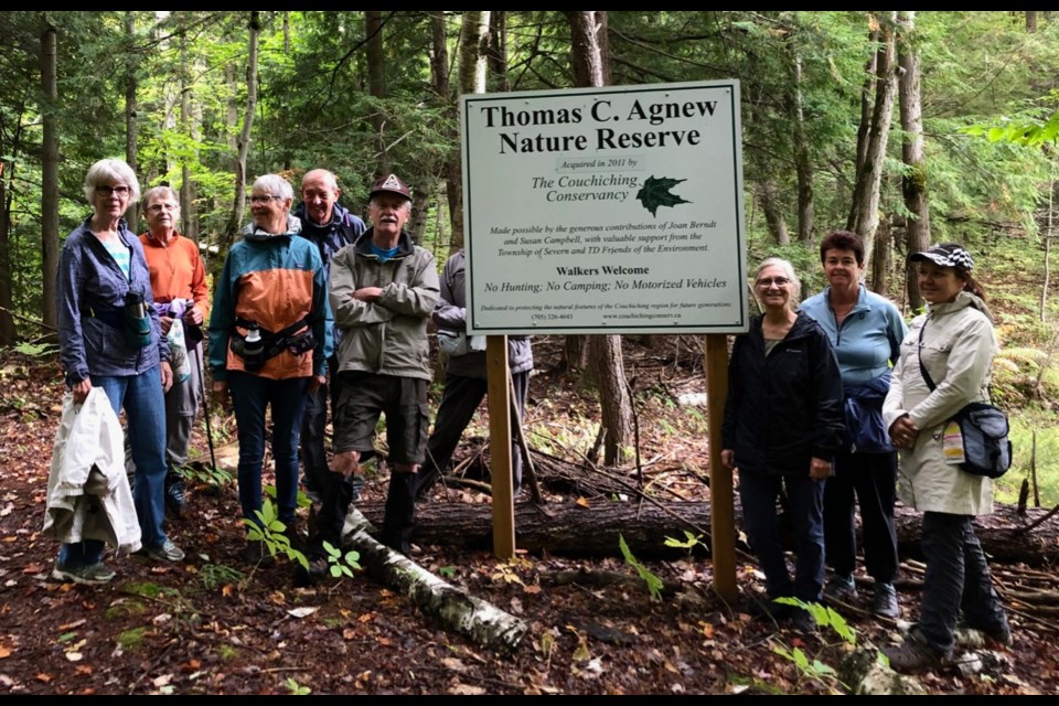 Members of the Orillia chapter of the Ganaraska Hiking Club pose during a trek through the Thomas Agnew property of the Couchiching Conservancy. Contributed photo