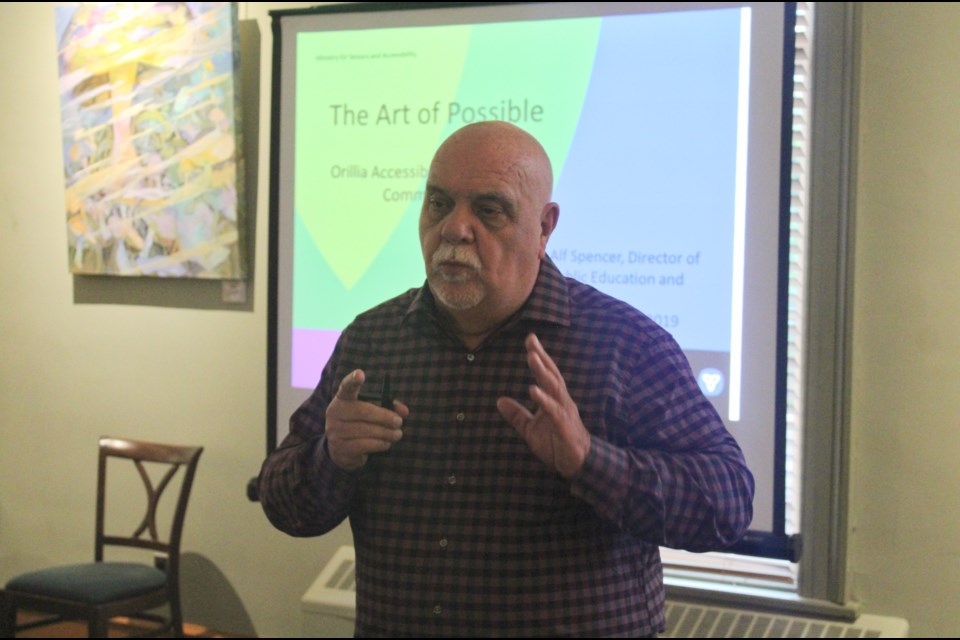 Alf Spencer, director of the outreach and strategic initiatives branch with the Accessibility Directorate of Ontario, speaks Wednesday during an accessibility awareness and education seminar at the Orillia Opera House. Nathan Taylor/OrilliaMatters