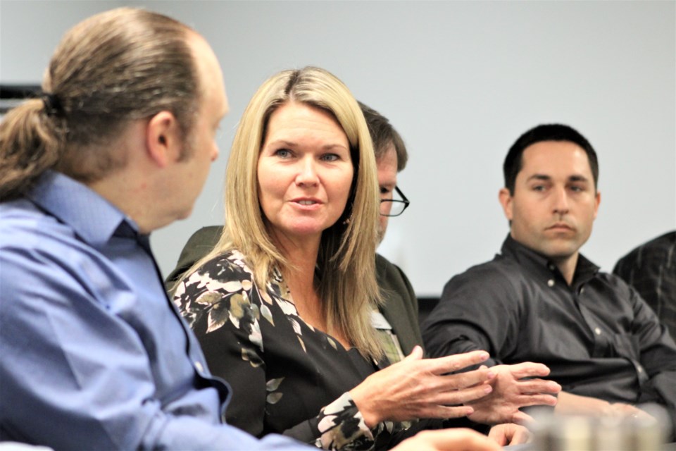 Simcoe North MPP Jill Dunlop speaks with Matthew Webb, of Kubota, during a roundtable discussion Friday at the Orillia City Centre. Nathan Taylor/OrilliaMatters